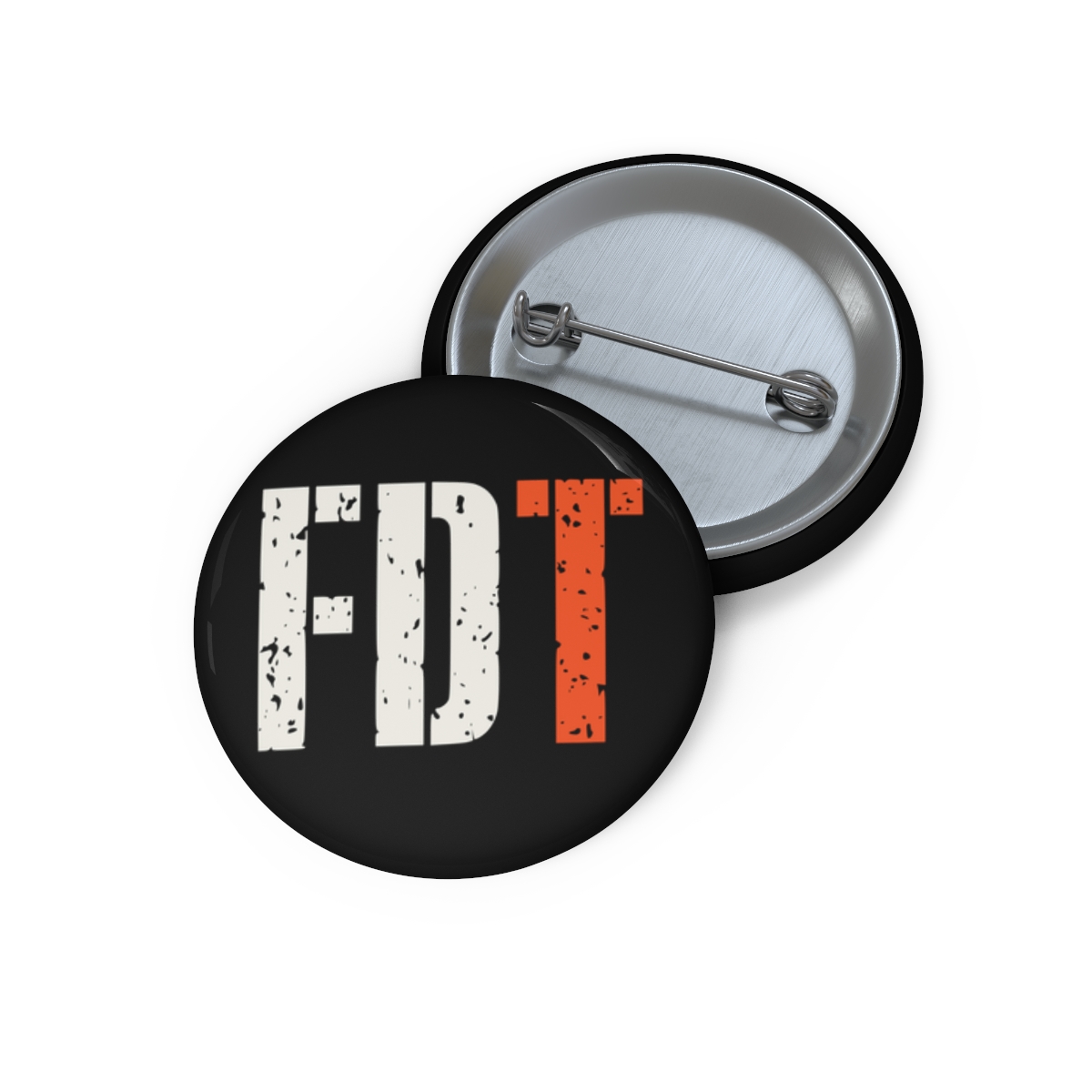 FDT pin button with black and orange lettering